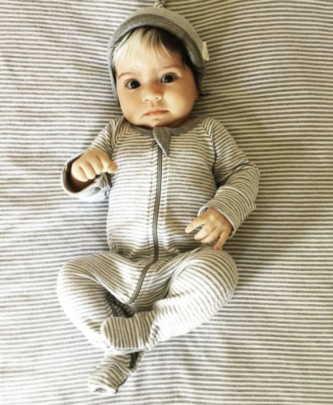 This little atypical with white hair is already three years old. What does she look like now?